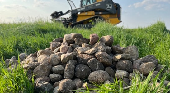 Rock pile with rock picker